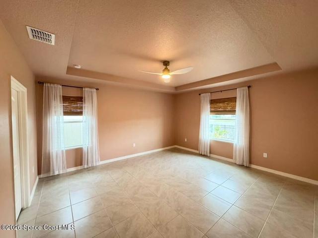 Tiled floors. Window treatments stay.