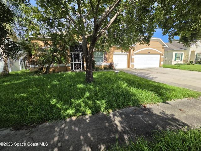 557 L M Davey Lane, Titusville, FL, 32780 photo 2