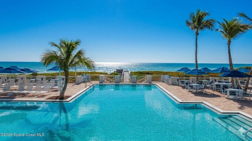 Experience coastal serenity at the Beach Club, where your private beach retreat, sun-drenched pool deck, and sophisticated oceanfront bar and dining await.