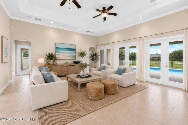 Living room opens to pool