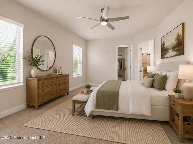 Large primary bedroom with his and hers closets-virtually staged