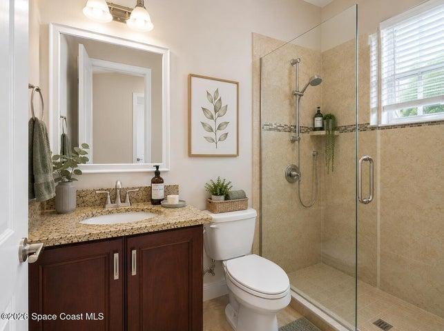 3rd full bathroom in hallway with 2 more bedrooms- virtually staged