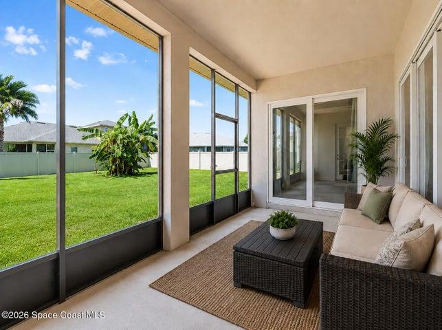 Trussed screened porch- virtually staged