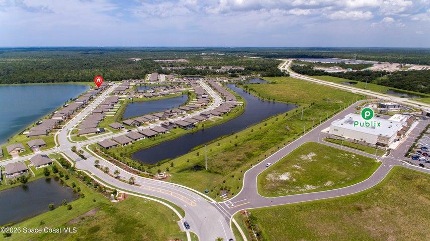 Aerial view showcasing Cypress Bay Preserve and the surrounding neighborhood, with convenient access to nearby roads, shopping, and everyday essentials.