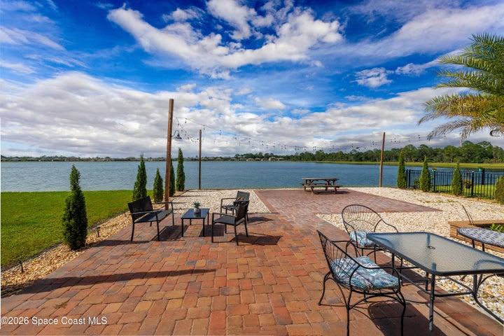 Enjoy peaceful lakefront living with a spacious outdoor entertaining area and beautiful water views right from the backyard.