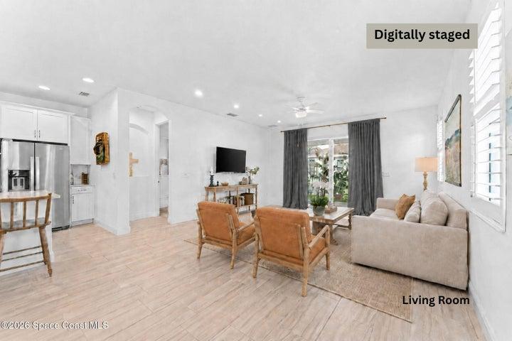 Comfortable living area with seamless flow to adjoining space