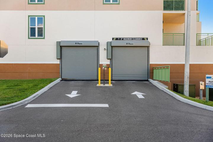 The secured residential garage provides protected resident parking, with separate first-level parking available for guests.