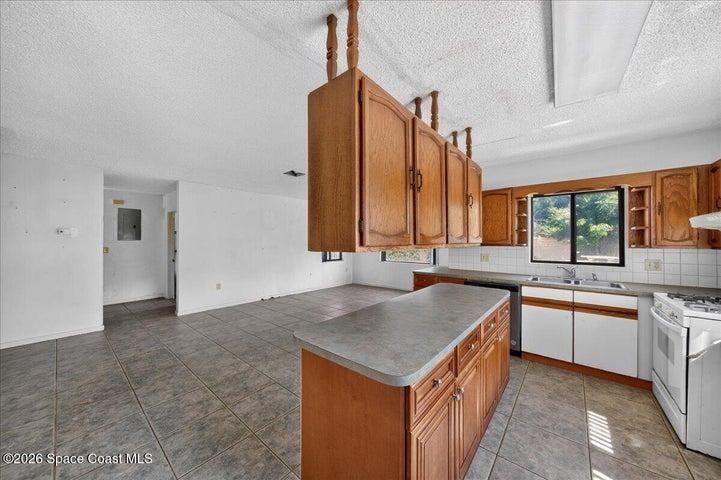Kitchen and view of living room