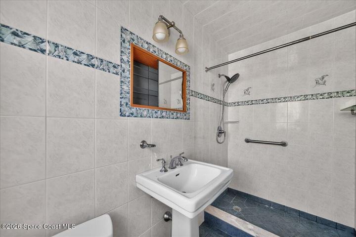 Primary bathroom with shower (no tub)