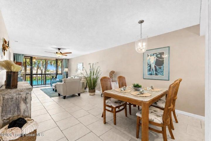 Spacious living room at 300 Columbia Drive Unit 3204 with natural light and views toward the water.