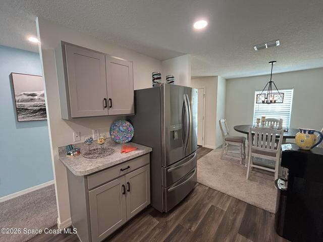 Modern kitchen cabinetry with matte black hardware