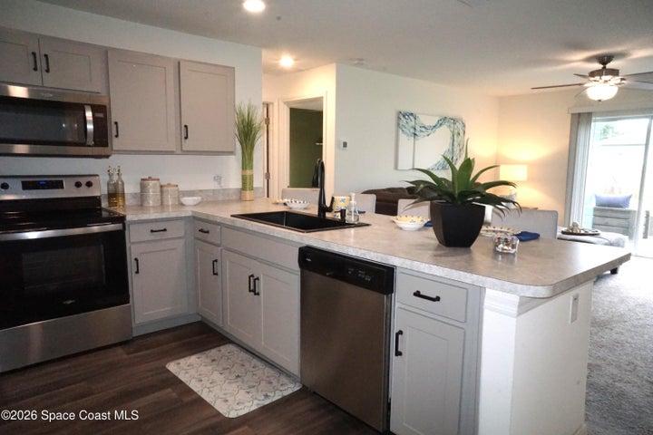 Kitchen open and bright, overlooking the great room.