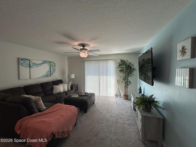 Open floor plan flows out to large backyard.