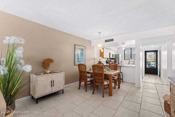 Spacious living room at 300 Columbia Drive Unit 3204 with natural light and views toward the water.
