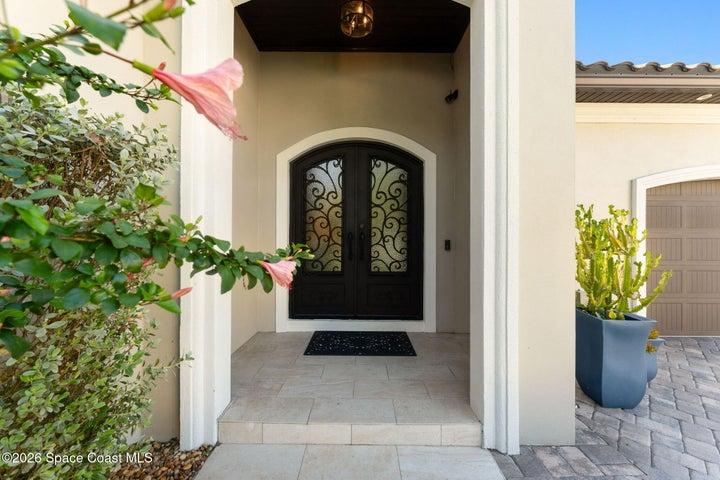 Covered front entry creating a warm and inviting first impression