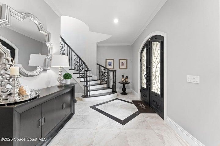 Elegant entrance foyer creating a warm first impression upon arrival