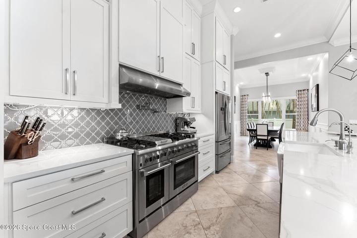 Well-appointed kitchen with ample cabinetry and counter space