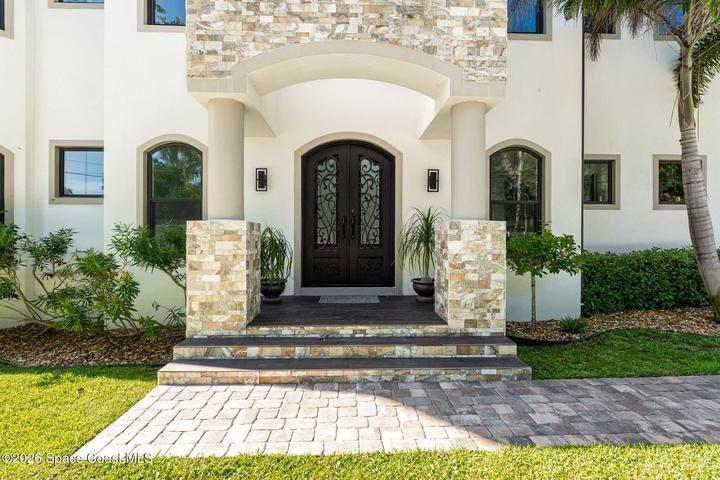 Covered front entry creating a warm and inviting first impression
