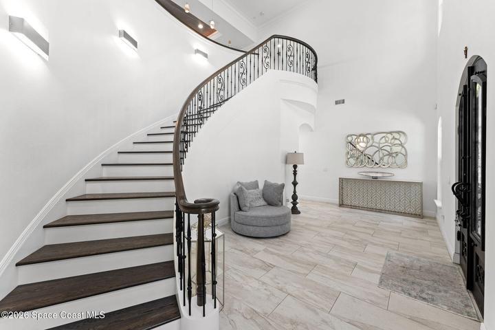 Elegant entrance foyer creating a warm first impression upon arrival