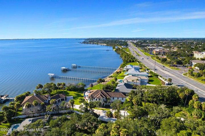 Aerial perspective showcasing the home’s impressive lot and surroundings.