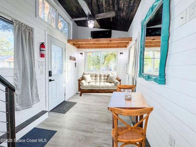 Room for a sleeper sofa or futon! Digitally enhanced.
