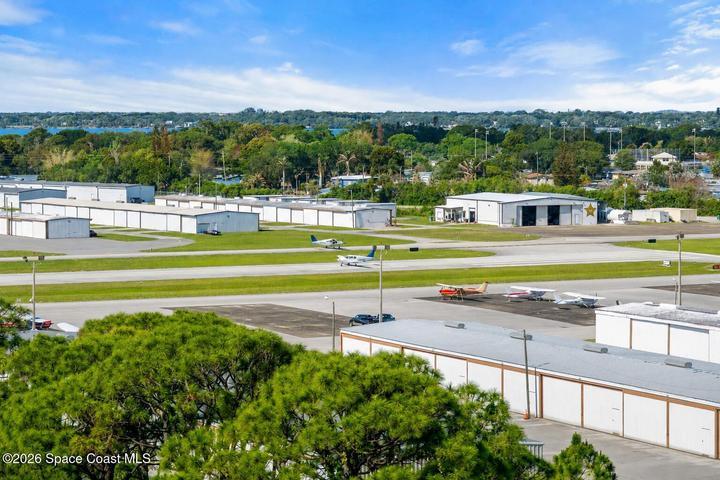 Aircraft arrivals and departures become part of the view from this ninth-floor residence overlooking Merritt Island Airport.
