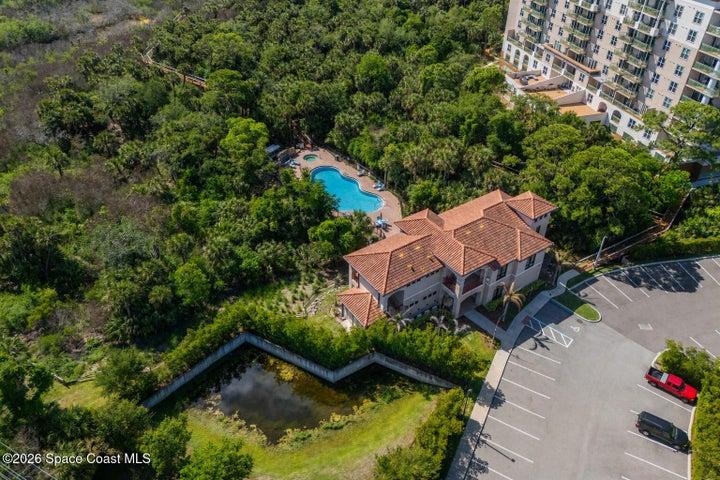 The resort-style pool is surrounded by the open landscape and waterfront atmosphere that distinguish River Fly-In.