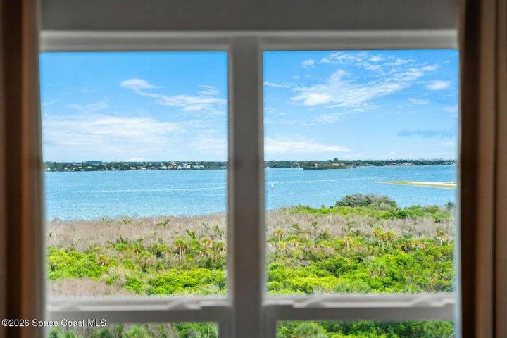 A direct runway view connects Bedroom 2 to the distinctive aviation setting of River Fly-In.