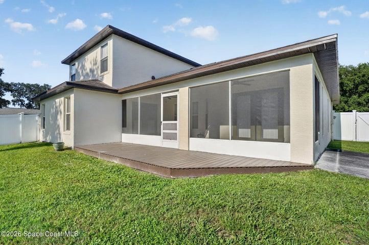 Rear porch with small deck, perfect for grilling.