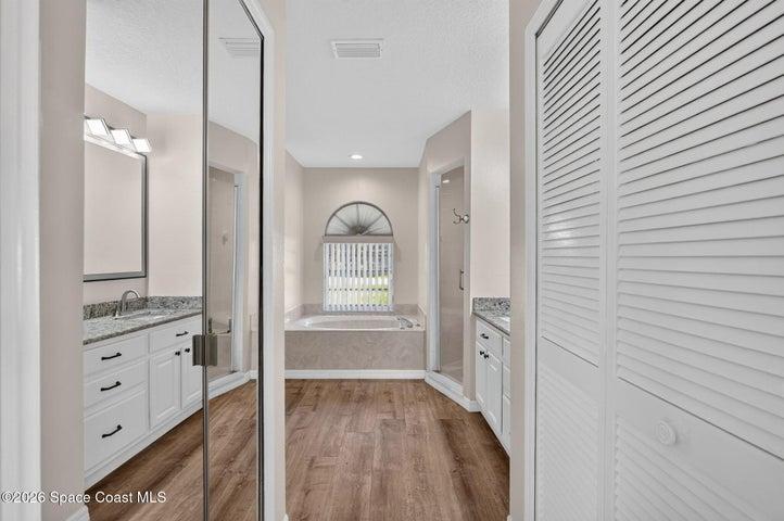 1st floor suite closets leading into bath