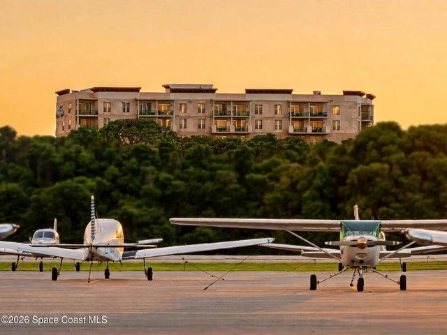 Aircraft arrivals and departures become part of the view from this ninth-floor residence overlooking Merritt Island Airport.