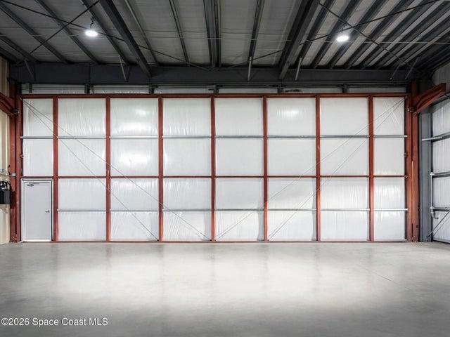 Planned 2,250-square-foot airport hangars are designed with expansive dimensions, 16-foot clearance and remote-controlled Hydroswing doors.