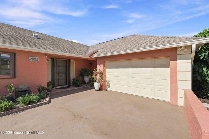 Spacious two-car garage with ample room for parking and storage.
