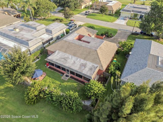 Aerial view showcasing the home and surrounding neighborhood.