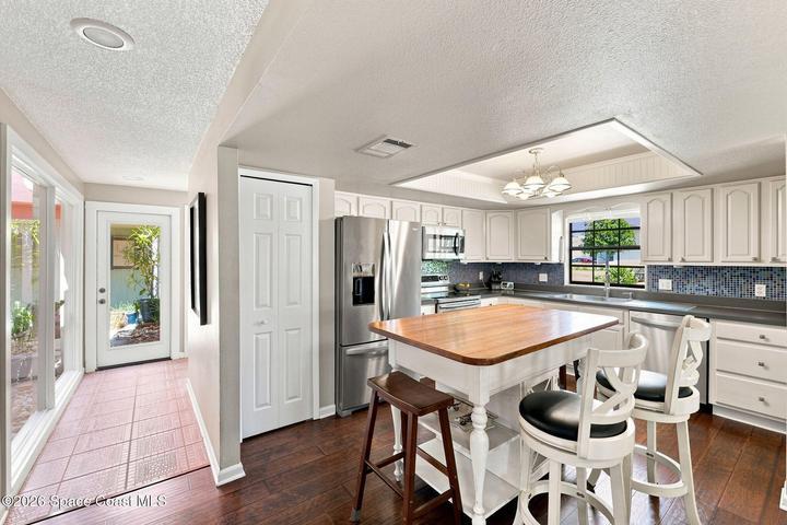 To the left of the entry way is your kitchen.