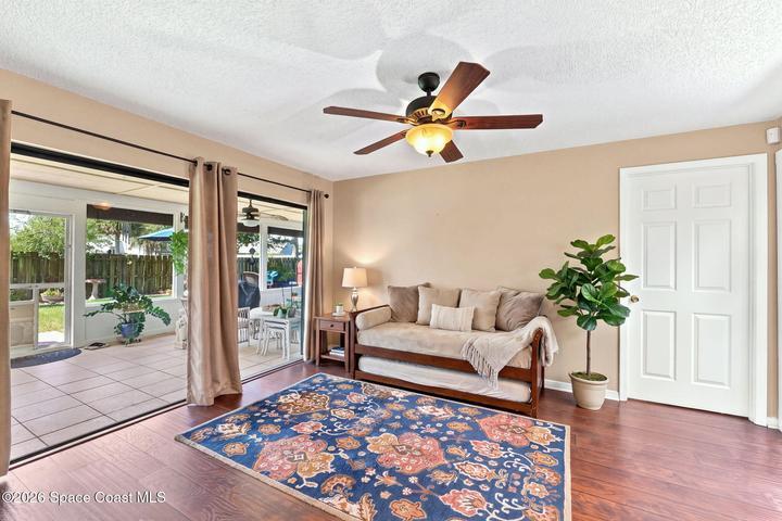 *Virtually staged flex room shown as a guest bedroom.*