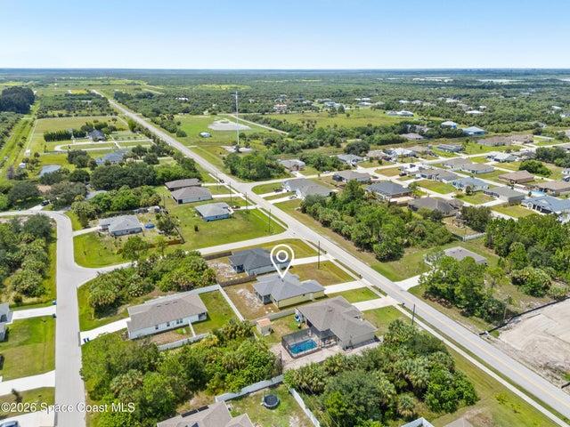Stunning overhead view highlighting the home’s location and beautiful setting