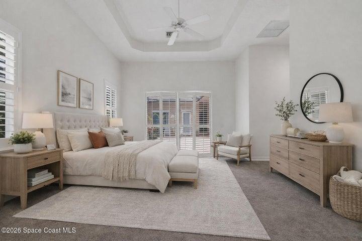 VStaged primary bedroom