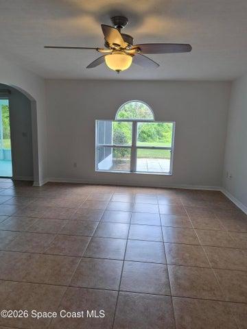 ENTERING FROM FRONT DOOR, AS YOU PASS, 1/2 BATH, EXTRA STORAGE,