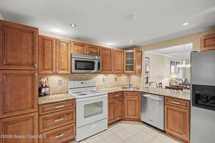 Luxurious maple kitchen cabinets with large drawers and lazy susans