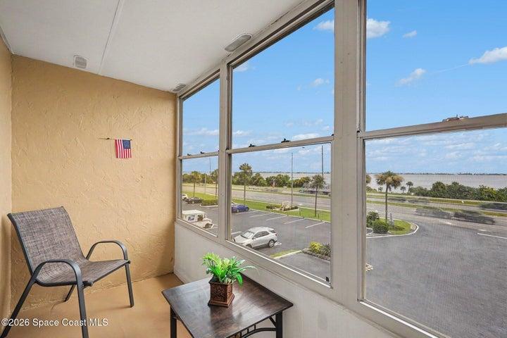large enclosed balcony with eastward views of magnificent morning sunrises and all day views of the Intracoastal Waterway