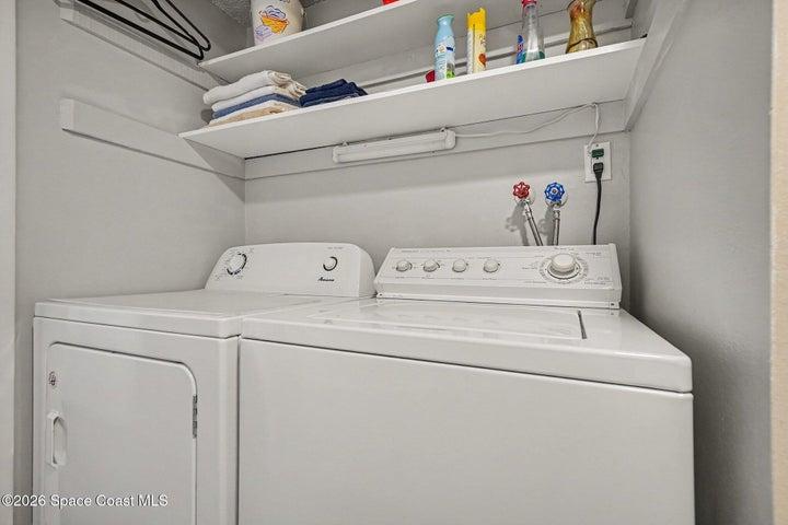 convenient laundry room with washer and dryer
