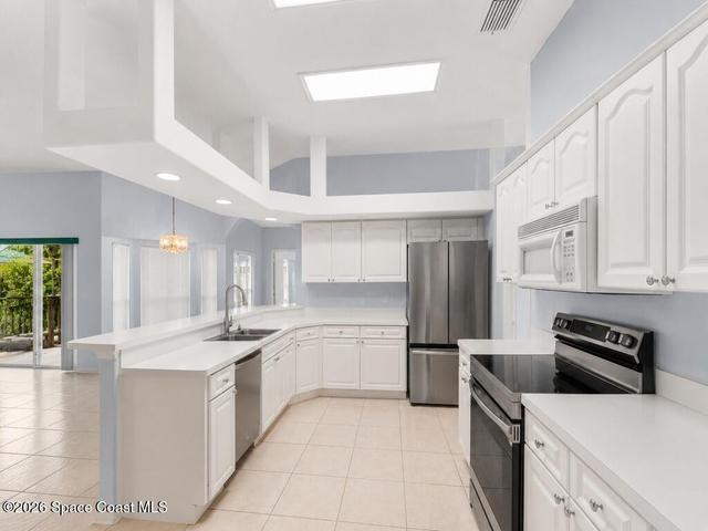 Kithcen Workstations with overhead lighting