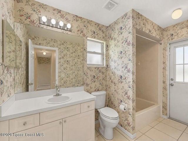 Main Bath with Pool door access.