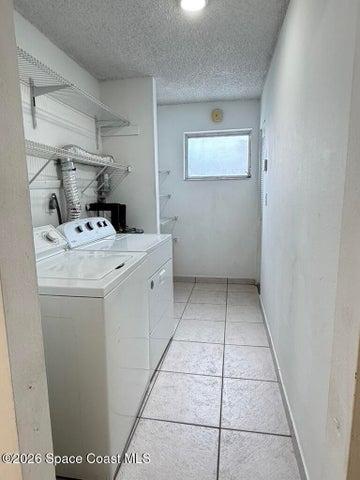 Large utility/laundry area and storage