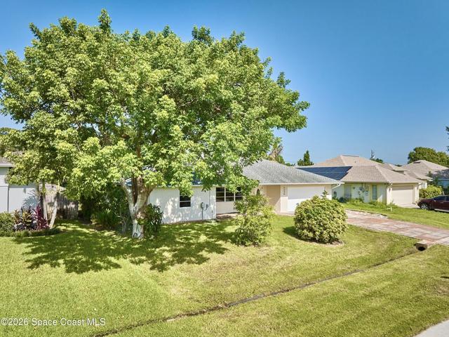 CBS Vintage Charmer loc'd in a desirable neighborhood now surrounded by Newer Constructed Homes. Ideal for INVESTORS, RENOVATORS and/or BUYERS w/a Vision. 2BR, 2BA, 2CGar w/500+sf cov'd screened lanai overlooking a spacious backyard