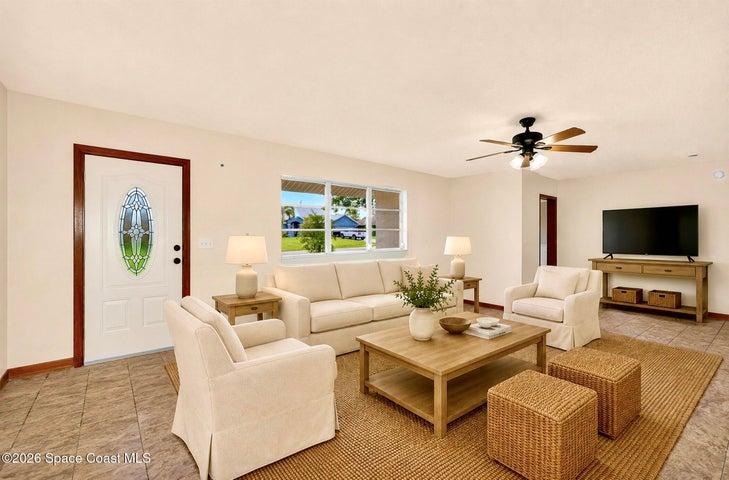 VIRTUALLY STAGED - LARGE LIVING AREA, opens to dining and kitchen areas.
