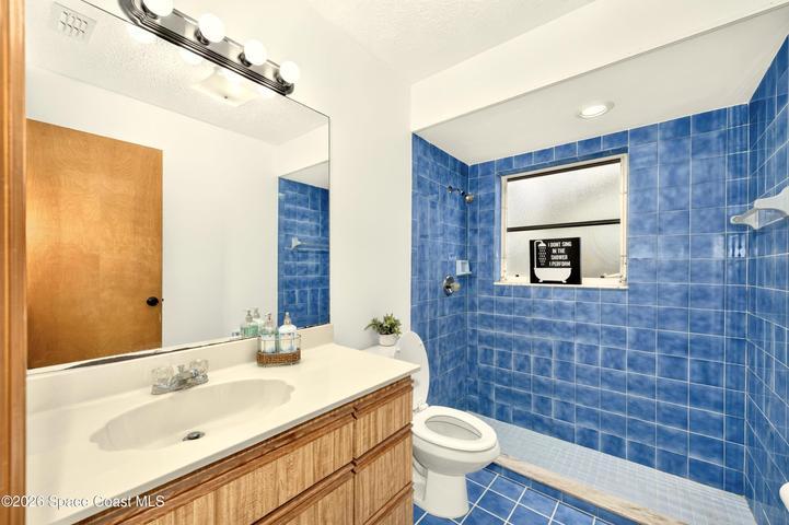 BATHROOM 2 - Adjacent to Bedroom 2 and easily accessible from the living area.