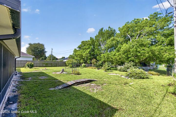 LARGE BACKYARD with room to create your own outdoor retreat.