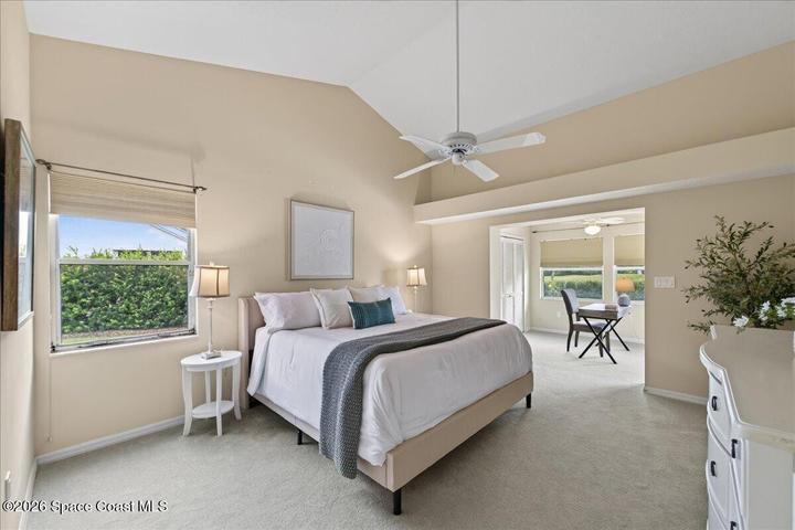 Large Primary Suite, with vaulted ceilings and an attached sitting area / office